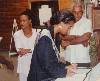 MG 1 (495Wx403H) - Erica, chaperoned by Maureen German, signs Visitors Book on an official visit. 
